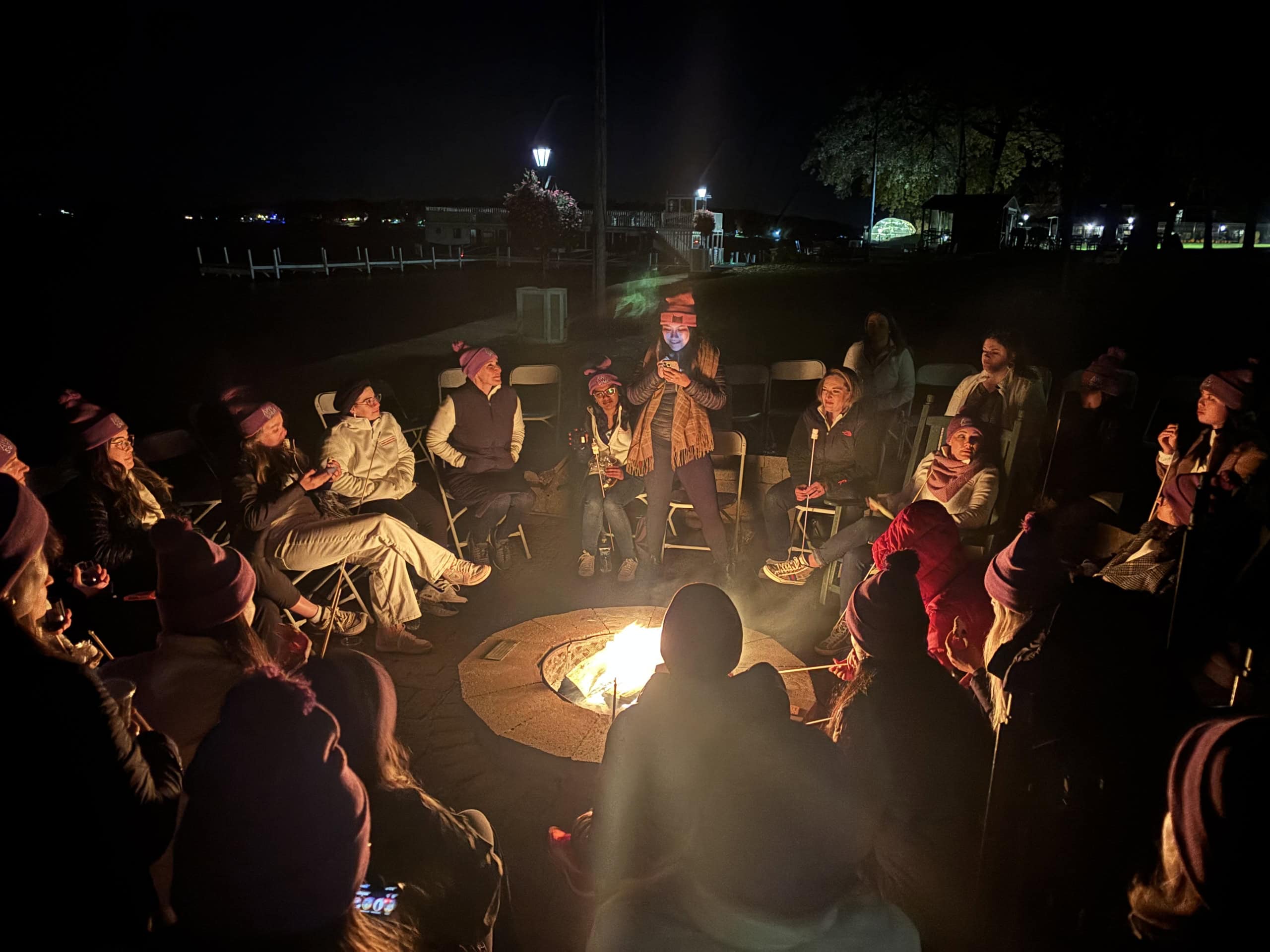 Scholars around a camp fire