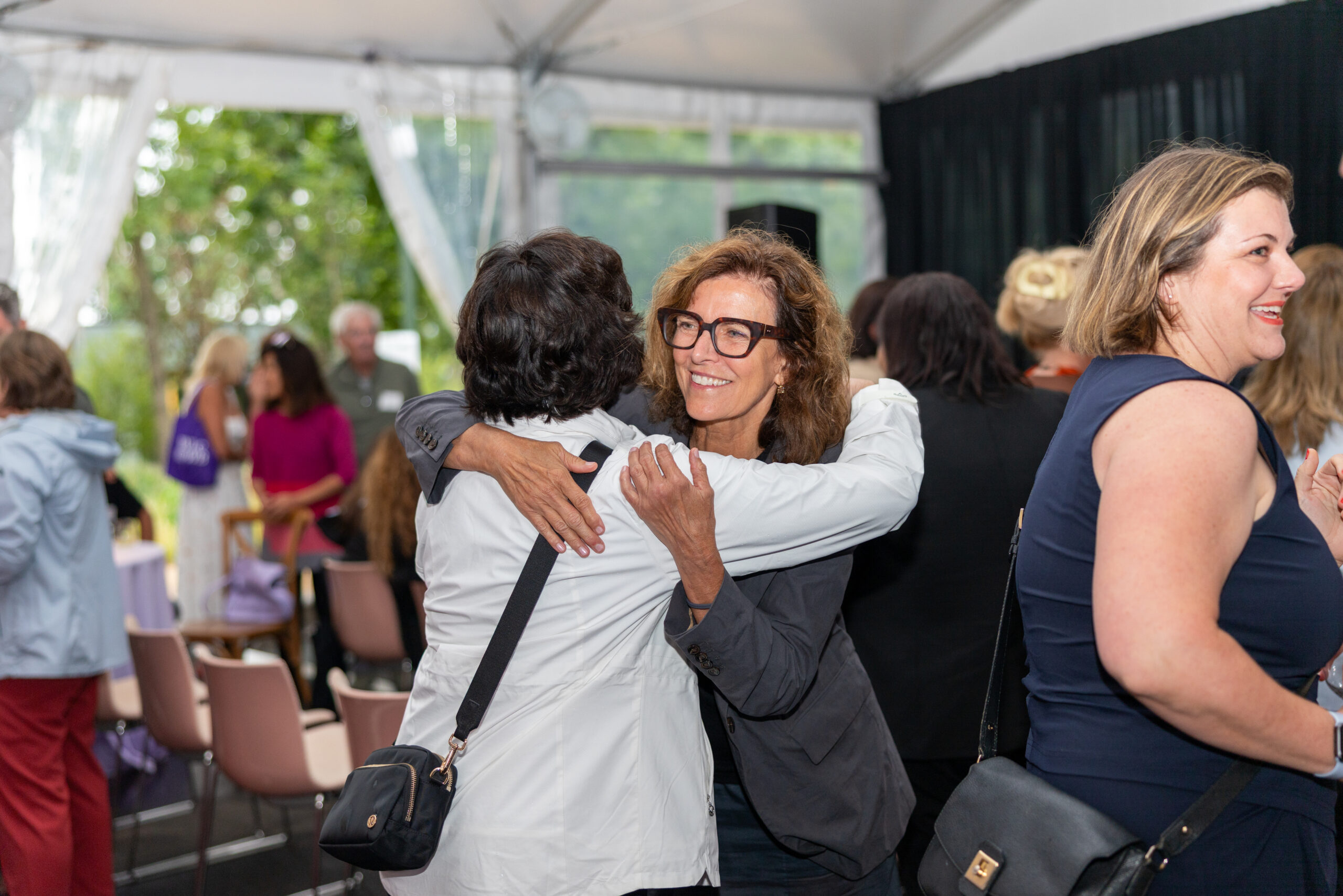 architect and advisory board member greet each other