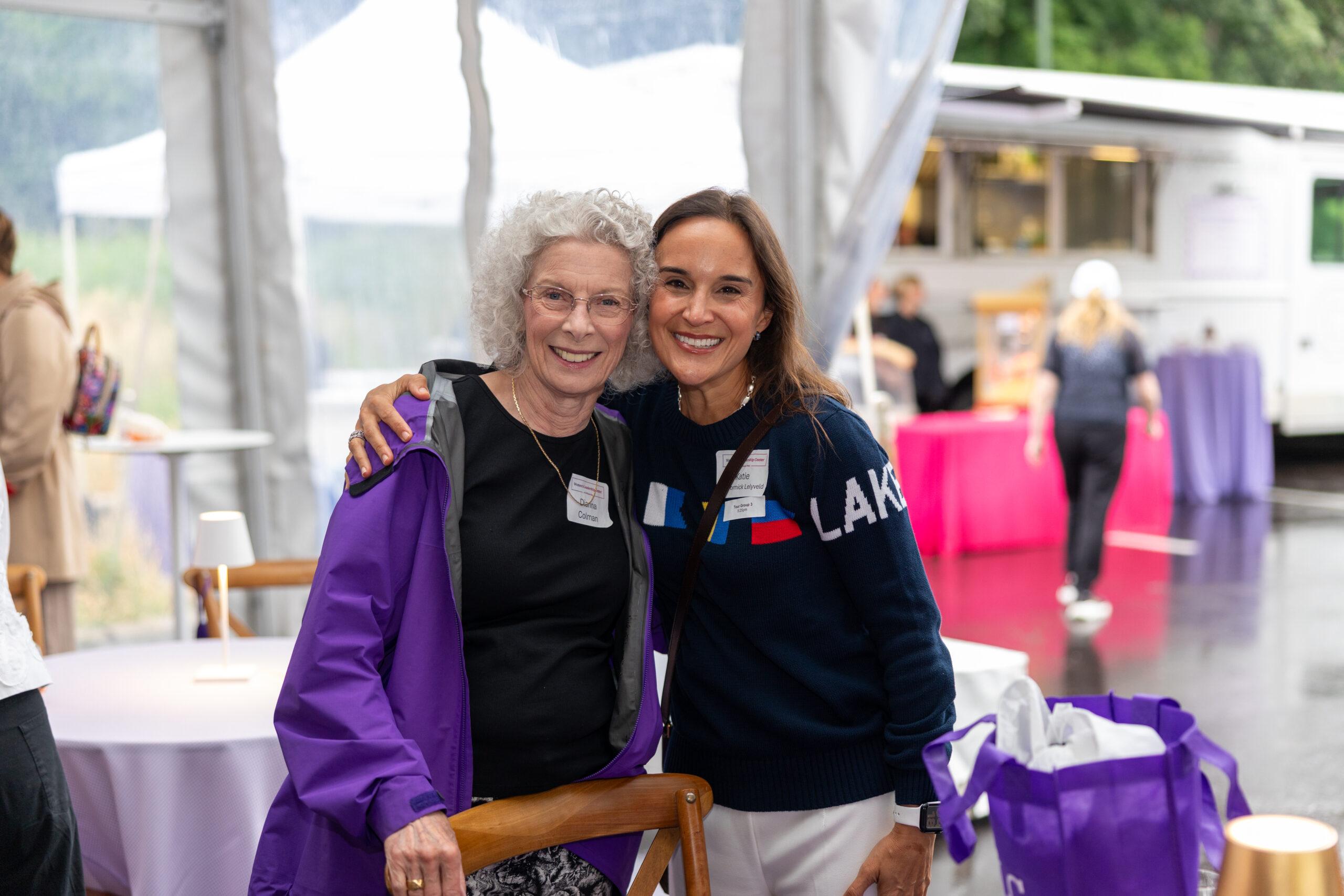two attendees of the ribbon cutting celebration